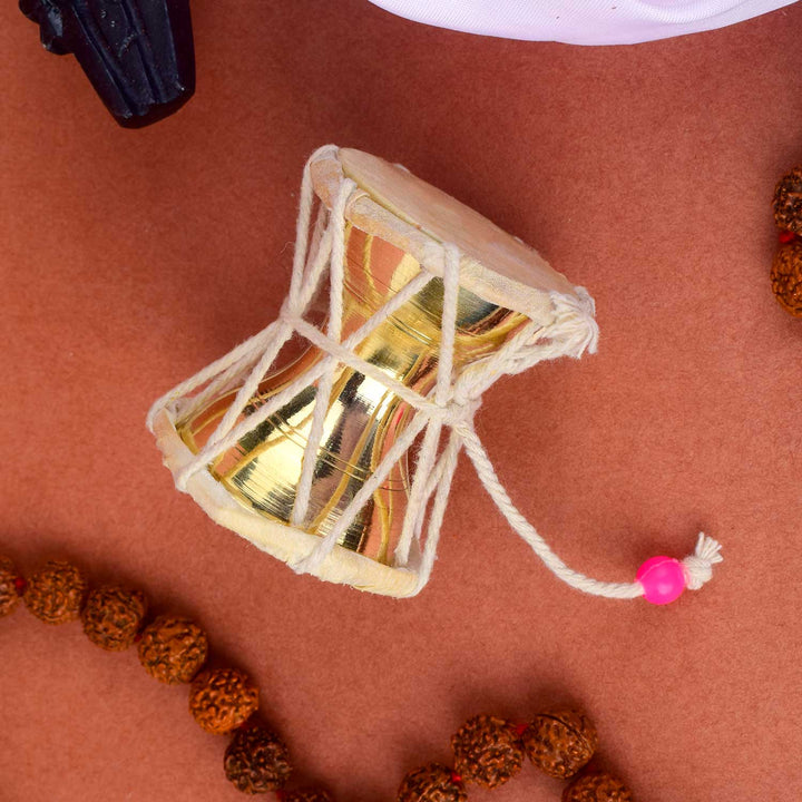 2.5 Inch Divine Brass Damru for Lord Shiva, beautifully handcrafted β ideal for spiritual rituals and pooja. Indiaβs Largest Pooja Accessories Brand β www.satvikstore.in