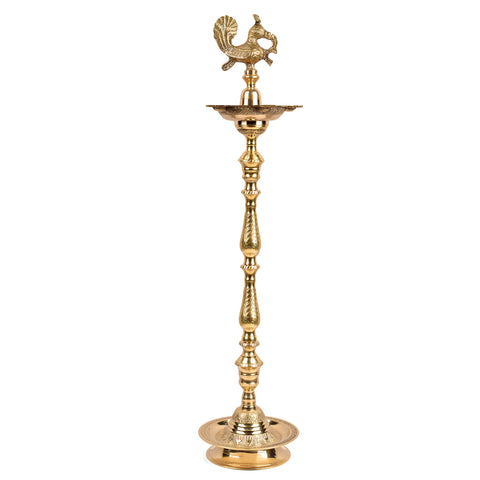 52 Inch Brass Kerala Peacock Samai Deepam Inauguration Lamp β Handcrafted Kerala samai deepam with a detailed peacock design, perfect for grand inaugurations, pooja ceremonies, and religious occasions. Indiaβs Largest Pooja Accessories Brand β www.satvikstore.in