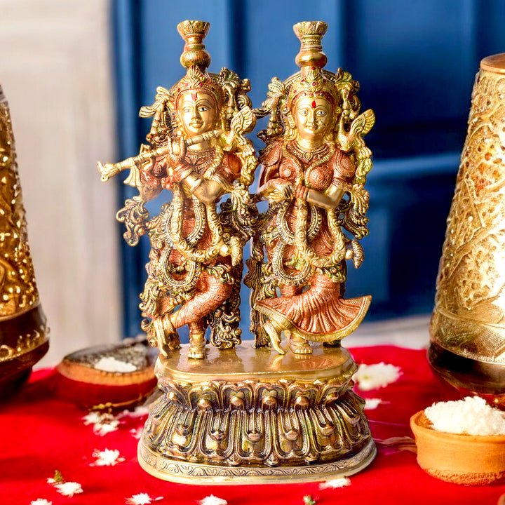 This Stunning Radha Krishna Brass Idol beautifully captures the divine love and grace of Radha and Krishna. Crafted from high-quality brass with intricate detailing, it exudes elegance and spiritual charm.