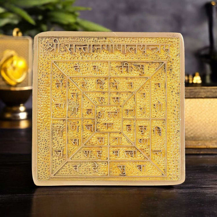 Asht Dhatu Shree Santan Gopal Yantra engraved with divine child-form Krishna symbols, used for fertility, safe pregnancy, and blessings of healthy children. Indiaβs Largest Pooja Accessories Brand - www.satvikstore.in