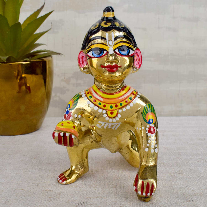 Brass Bal Gopal Idol (Size 6) depicting Laddu Gopal in a playful pose for home temple worship. Indiaās Largest Pooja Accessories Brand - www.satvikstore.in