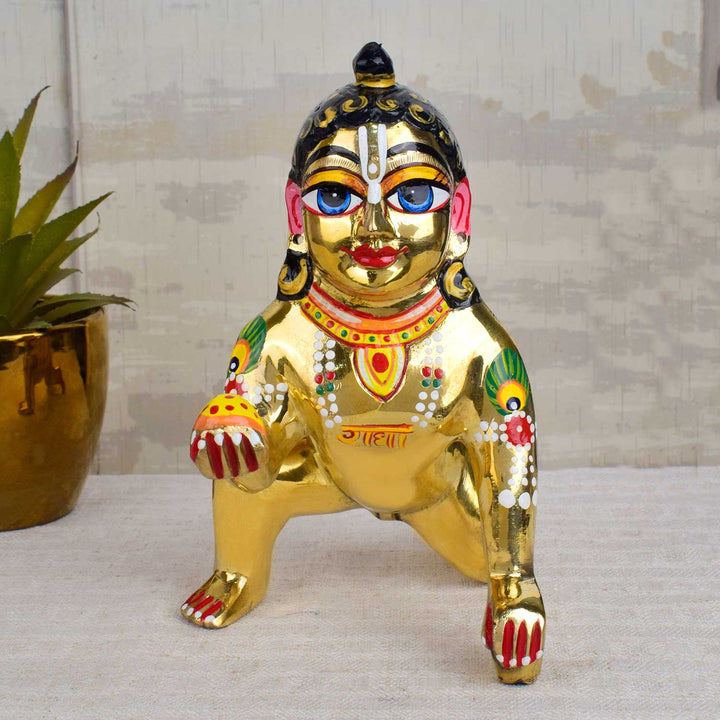 Brass Bal Gopal Idol (Size 9) depicting Laddu Gopal in a playful pose for home temple worship. Indiaās Largest Pooja Accessories Brand - www.satvikstore.in