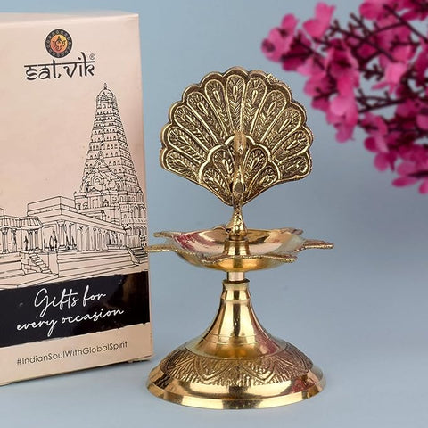 Handcrafted Brass Flying Peacock Kerala Samai Deepam Puja Diya β Exquisite brass diya in the shape of a flying peacock, designed for traditional Kerala-style rituals and pooja ceremonies. Indiaβs Largest Pooja Accessories Brand β www.satvikstore.in