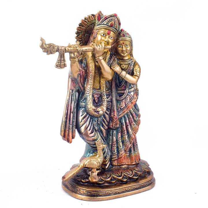 The 9 Inch Radha Krishna β Divine Presence in a Beautiful Idol is a stunning masterpiece that beautifully portrays the eternal love and devotion between Radha and Krishna. This intricately crafted idol captures the divine couple in an elegant and serene pose, with Krishna playing his enchanting flute and Radha radiating grace and love.