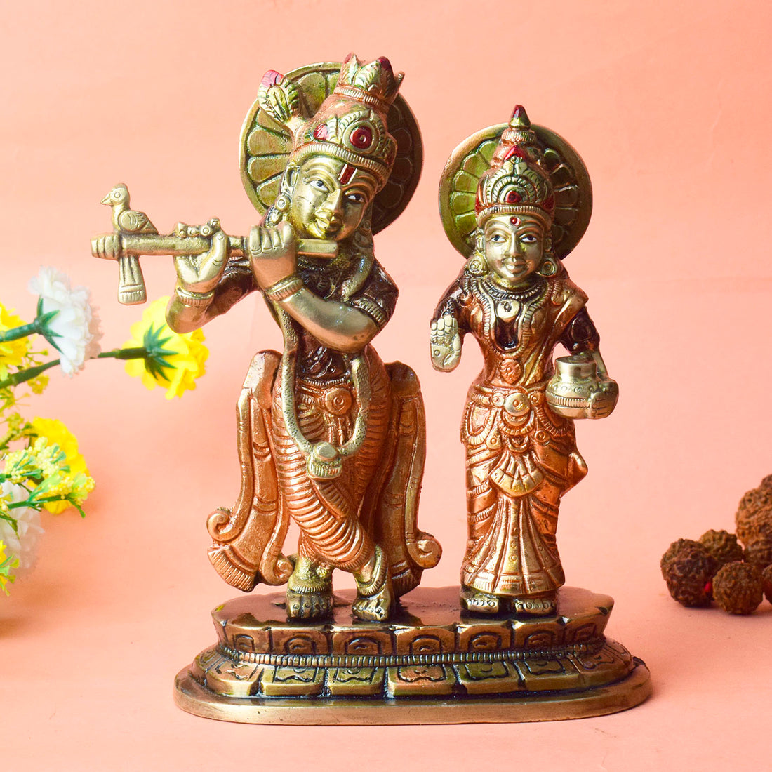 The 6.7 Inch The Divine Duo – Radha Krishna Idol of Sacred Love beautifully captures the eternal bond between Radha and Krishna, embodying the essence of divine love and spiritual connection. This intricately crafted idol depicts Radha and Krishna in a timeless and serene pose, with Krishna playing his flute and Radha standing gracefully by his side.