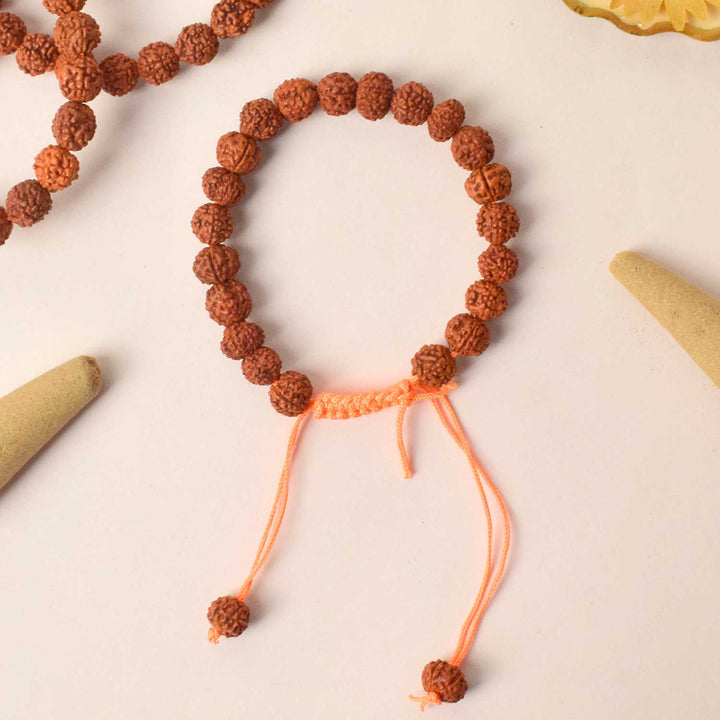 Handcrafted dark brown Rudraksha bracelet made with sacred beads for spiritual balance and meditation. India’s Premium Rudraksha Jap Mala Store- www.satvikstore.in