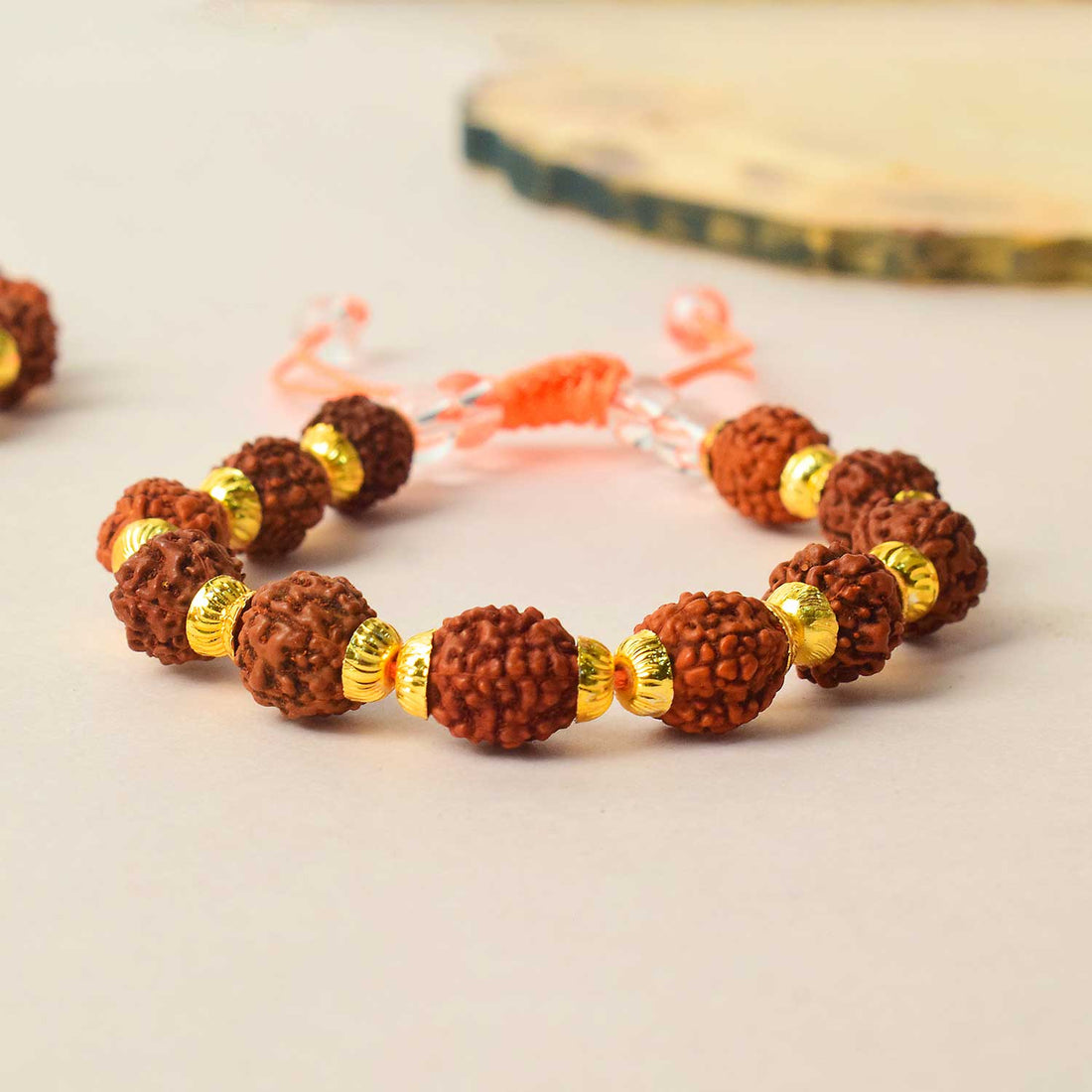 Certified dark brown rudraksha bracelet with golden brass capping for spiritual healing and protection. Indiaโs Premium Rudraksha Jap Mala Store- www.satvikstore.in