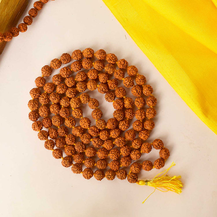 Certified natural brown Rudraksha mala with spiritual beads for mantra chanting and meditation. India’s Premium Rudraksha Jap Mala Store- www.satvikstore.in