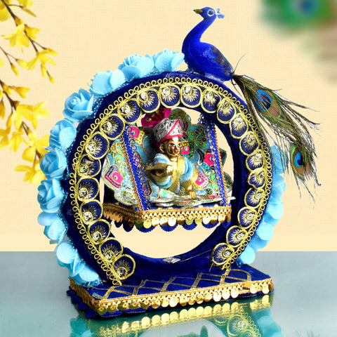Decorative Laddu Gopal Ji Jhula with vibrant peacock design, ideal for pooja decor and Janmashtami celebrations. Indiaβs Largest Pooja Accessories Brand β www.satvikstore.in
