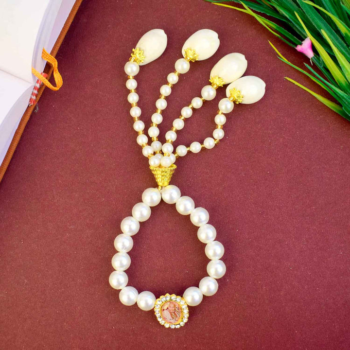 Elegant white pearl Guruji Swaroop Bracelet with handcrafted latkan, ideal for festive occasions, gifting, and spiritual connection. India’s Largest Pooja Accessories Brand – www.satvikstore.in