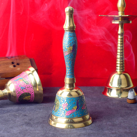 Handcrafted brass puja bell with vibrant blue handle, perfect for temple rituals and home prayers, enhancing spiritual ambiance. Indiaβs Largest Pooja Accessories Brand β www.satvikstore.in