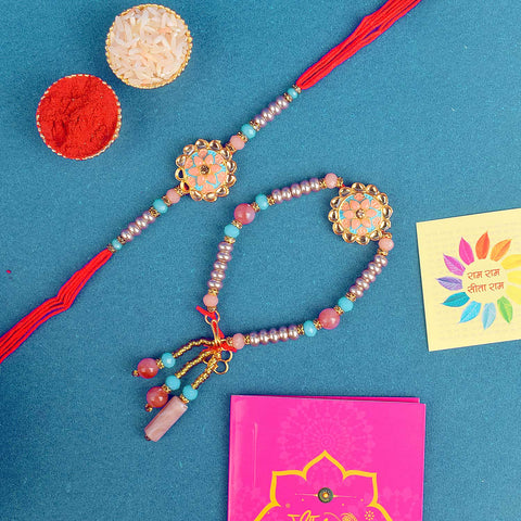 Designer Couple Rakhi Set for Bhaiya and Bhabhi with Roli Chawal and Ram Sita Stickers β Raksha Bandhan Gift Combo. Indiaβs Largest Brass Idols Brand - www.satvikstore.in