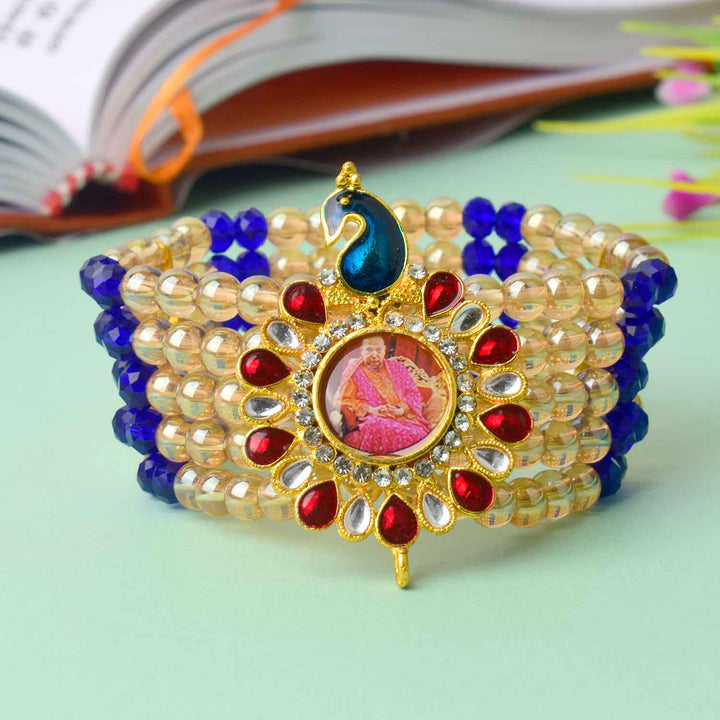 Multilayered Guruji Swaroop Bracelet made with golden and assorted colored beads β perfect for pooja, daily wear, and gifting. Indiaβs Largest Pooja Accessories Brand β satvikstore.in