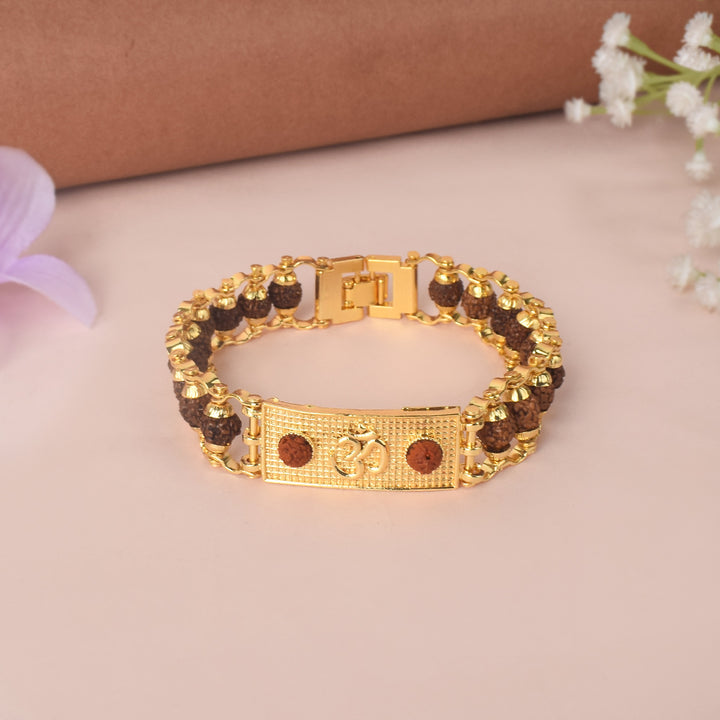 PVD Gold Plated Rudraksha Bracelet with Om symbol for divine blessings and positive energy. India’s Largest Pooja Accessories Brand - www.satvikstore.in