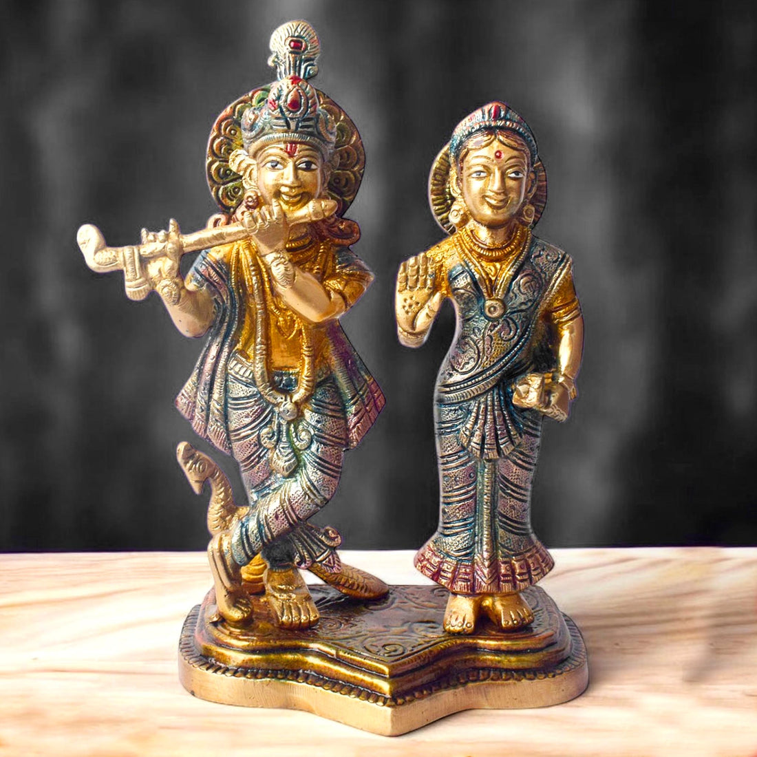 The 8 Inch Radha Krishna Idol โ A Symbol of True Devotion and Love is a magnificent representation of the eternal bond between Radha and Krishna, capturing the purity and depth of their divine love. This beautifully crafted idol depicts Krishna playing his flute, while Radha stands beside him, radiating grace, love, and devotion.