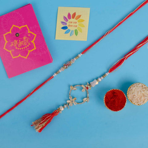 Designer Couple Rakhi Set for Bhaiya and Bhabhi with Roli Chawal and Ram Sita Stickers β Raksha Bandhan Gift Combo. Indiaβs Largest Brass Idols Brand - www.satvikstore.in