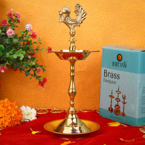 8 Inch Brass Peacock Kerala Diya β Handcrafted brass diya featuring a peacock motif, perfect for pooja rituals, temple lighting, and traditional dΓ©cor. Indiaβs Largest Pooja Accessories Brand β www.satvikstore.in