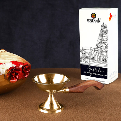 Fascinating Aarti Diya with Curved Wooden Handle β Elegant brass diya with a beautifully curved wooden handle, designed for pooja ceremonies and aarti. Indiaβs Largest Pooja Accessories Brand β www.satvikstore.in