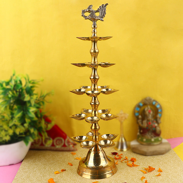 Brass 5 Step Panchmukhi Peacock Kerala Diya β Handcrafted brass diya with a five-step structure, Panchmukhi (five-faced) design, and peacock motif, perfect for pooja rituals, temple lighting, and traditional dΓ©cor. Indiaβs Largest Pooja Accessories Brand β www.satvikstore.in