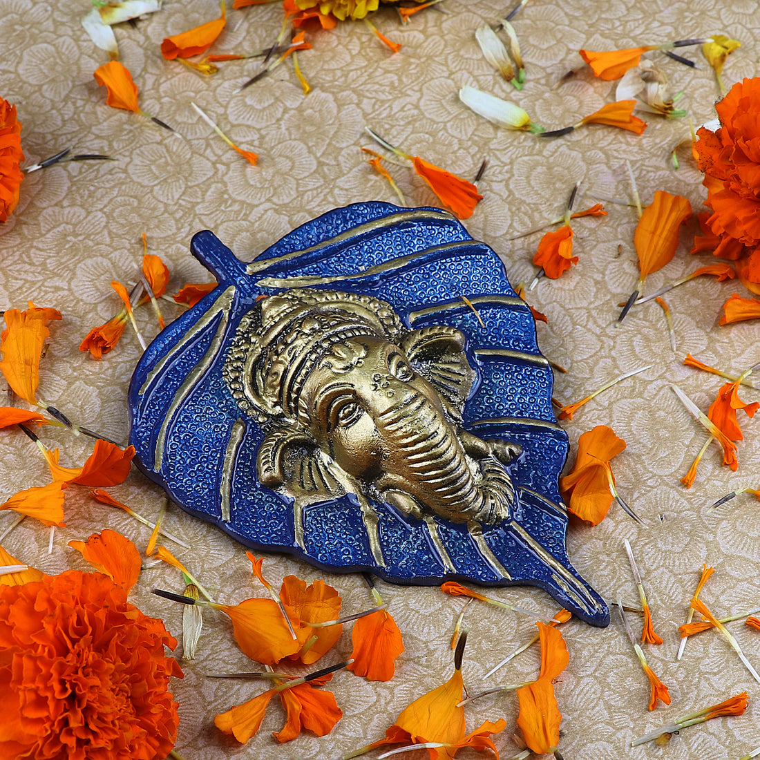 1 Pc Lord Ganesh Face on Leaf Patta Wall Hanging - Blue