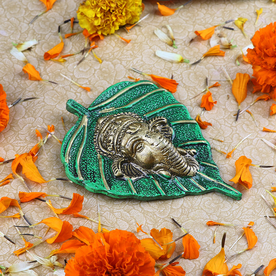 1 Pc Lord Ganesh Face on Leaf Patta Wall Hanging White