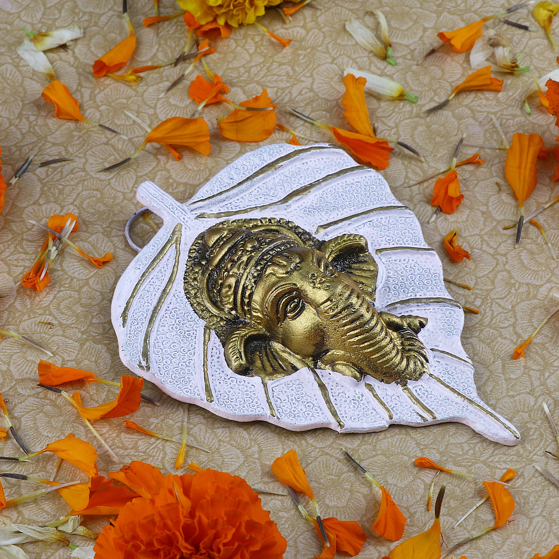 1 Pc Lord Ganesh Face on Leaf Patta Wall Hanging White