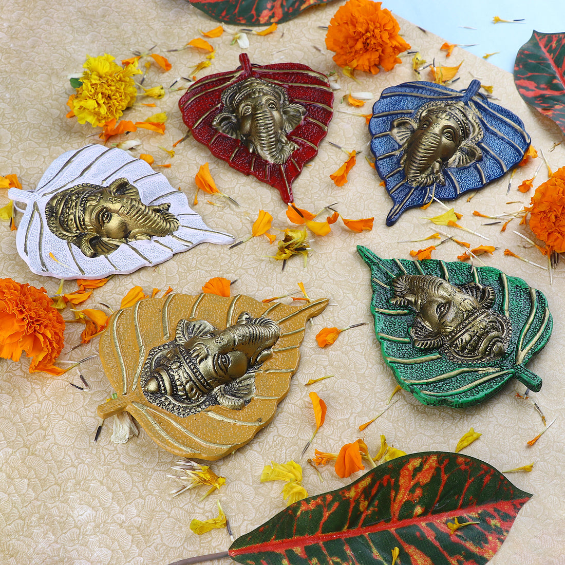 1 Pc Lord Ganesh Face on Leaf Patta Wall Hanging - Red