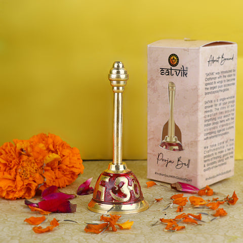 Om Swastik Brass Puja Bell in red finish, featuring sacred symbols and a traditional design for spiritual rituals and aarti ceremonies. Indiaβs Largest Pooja Accessories Brand β www.satvikstore.in