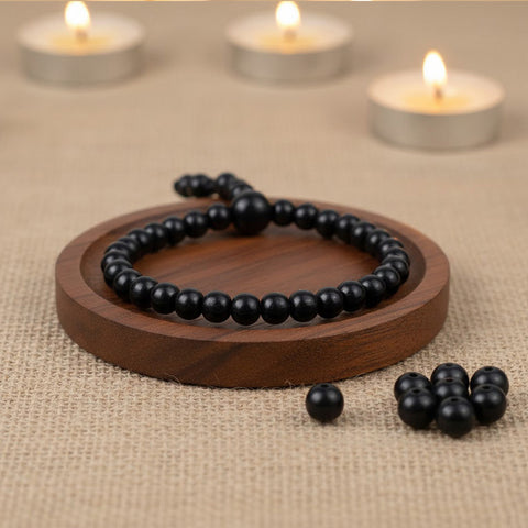 6 mm government certified Karungali bracelet with gloss finish, ideal for daily wear, spiritual protection, and positive energy.India’s Premium Jap Mala Store - www.satvikstore.in