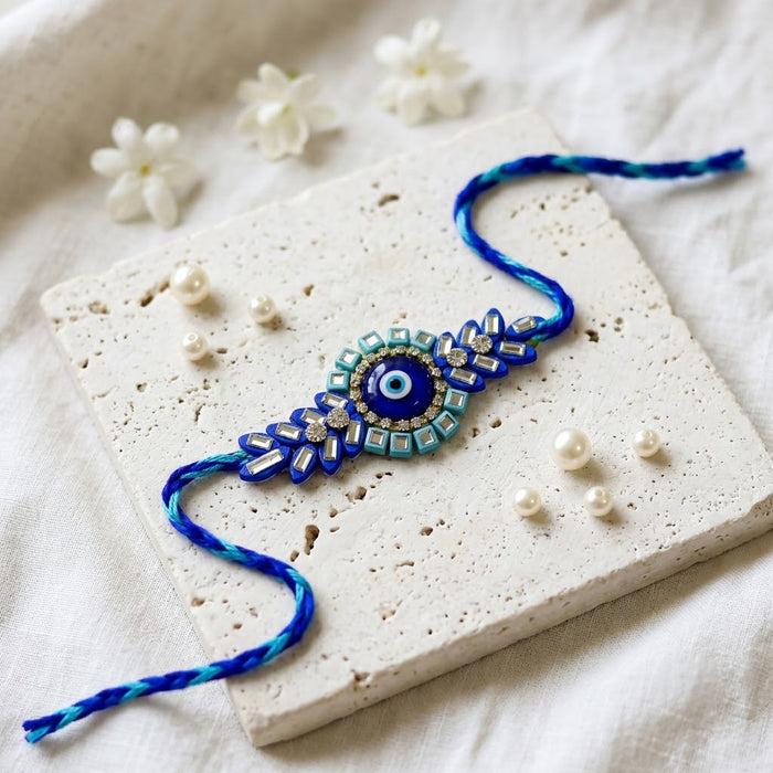 Royal Blue Evil Eye Centerpiece Crystal Leaf Motif Designer Rakhi