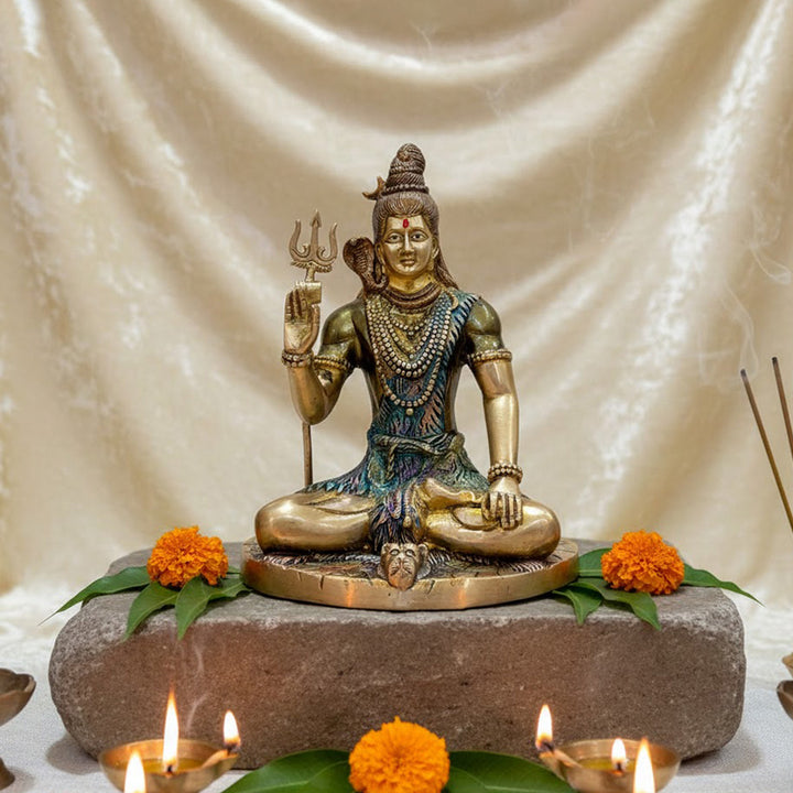 9.4 Inch Divine Brass Shiv Idol featuring Lord Shiva in a majestic seated pose, intricately crafted for home temple or spiritual decor. No.1 Brass Idol Store www.satvikstore.in 

