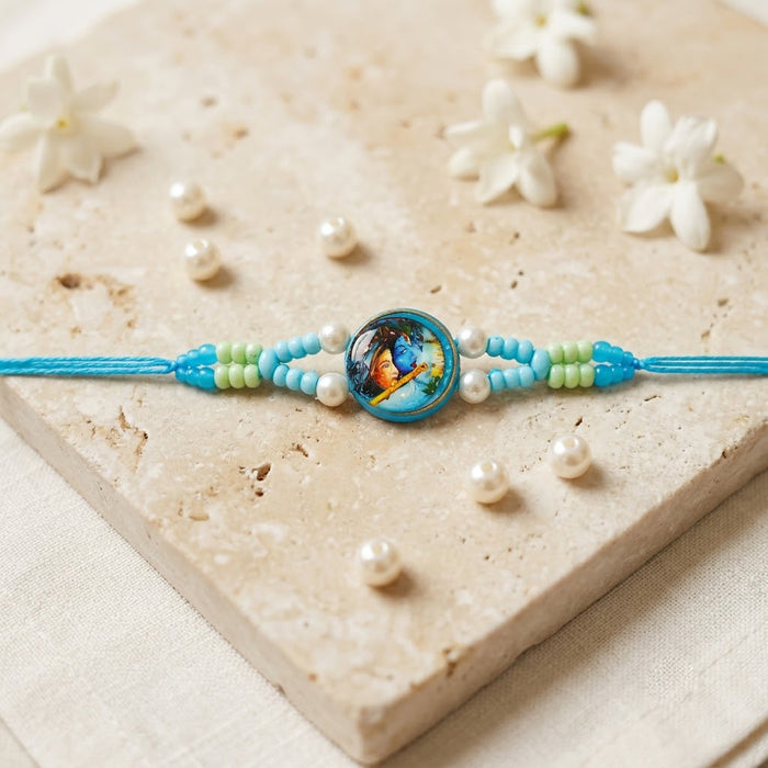 Divine Radha Krishna Emblem Pearl Accent Sky Blue Rakhi