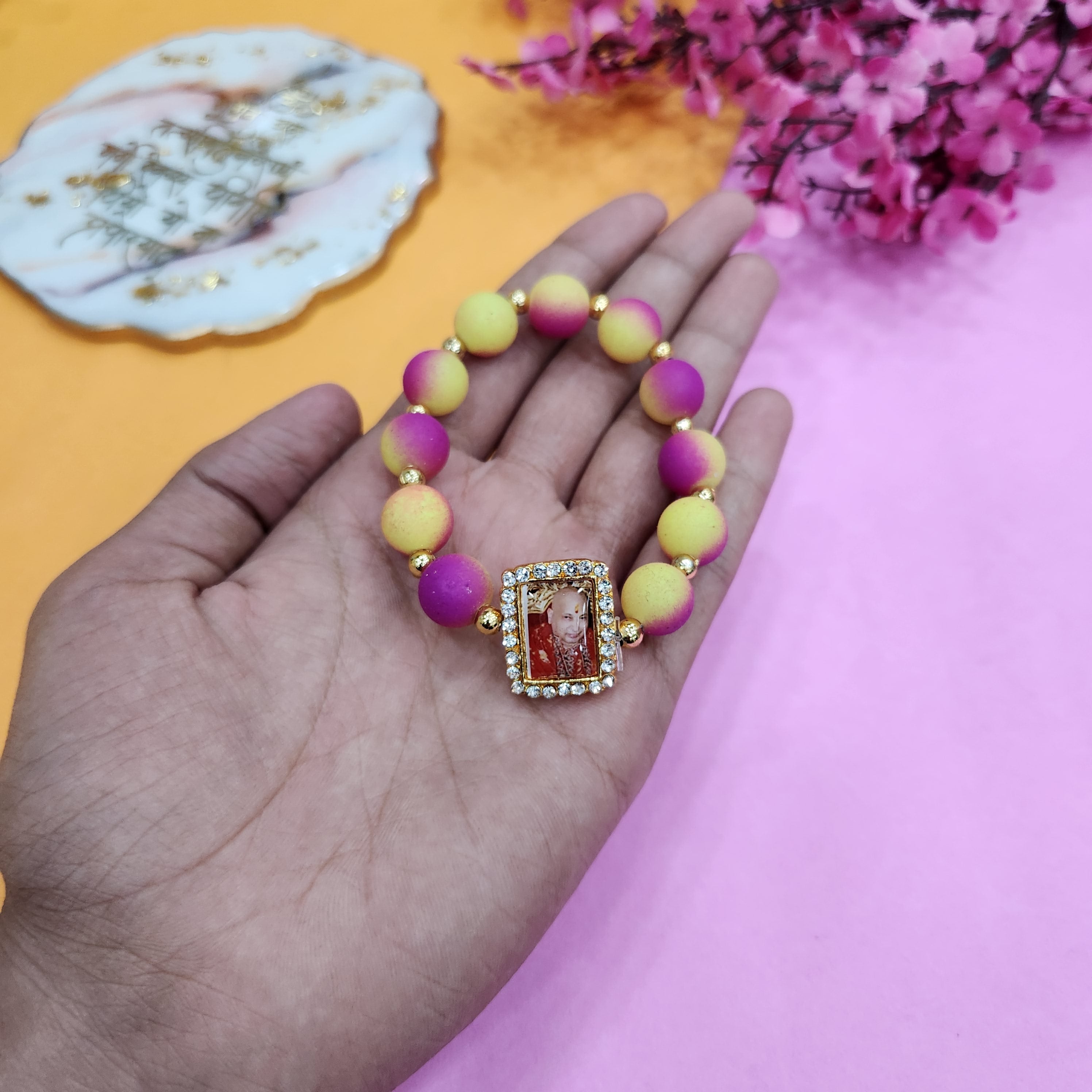 Shop Online: Jai Guruji Swaroop Yellow And Violet Round Pearl