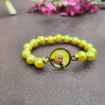 Yellow Round Pearl Bracelet with Jai Guruji Swaroop Handmade Bracelets for Men and Women.