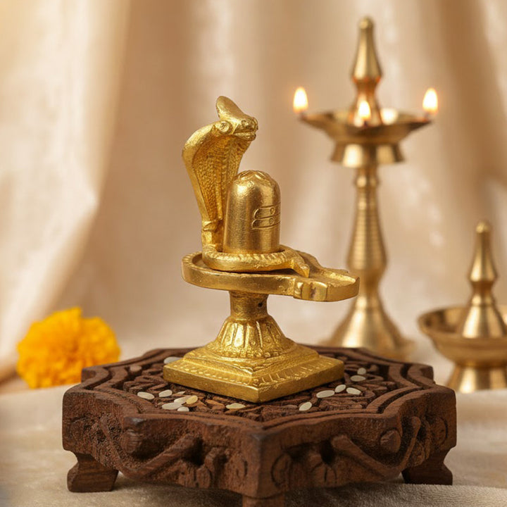 3.3 Inch Handcrafted Brass Shivlingam with Nag – Sacred Shiva Idol for Pooja, Meditation, and Home Temple Decor. No.1 Brass Idol Store www.satvikstore.in 