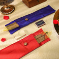 Darbari incense sticks with red and blue fragrance variants