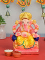 6-inch colorful eco-friendly Ganesha idol sitting on a decorative shinghasan, handcrafted from natural clay and painted with vibrant, non-toxic colors. India’s Largest Pooja Accessories Brand – www.satvikstore.in