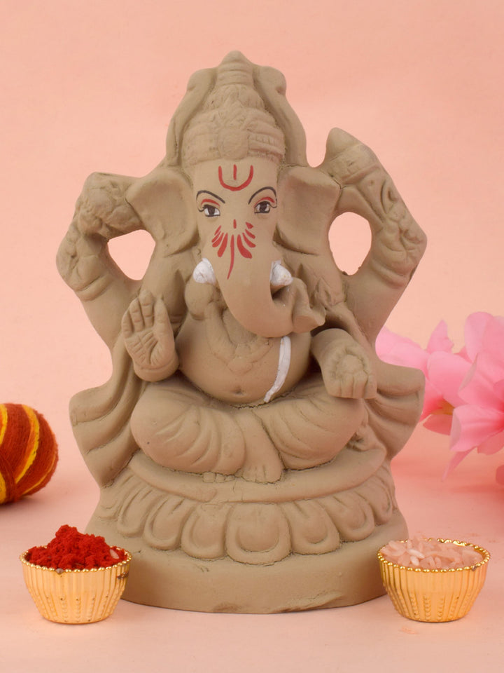 6 Inch Gajavaktra Eco-Friendly Ganesha Idol crafted from natural materials, featuring Lord Ganesha with one trunk and eco-conscious design for environmentally friendly celebrations. India’s Largest Pooja Accessories Brand – www.satvikstore.in
