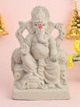 7 Inch Lord Ganesha idol seated majestically on a decorative Shinghasan, crafted in eco-friendly material with intricate detailing. India’s Largest Pooja Accessories Brand – www.satvikstore.in