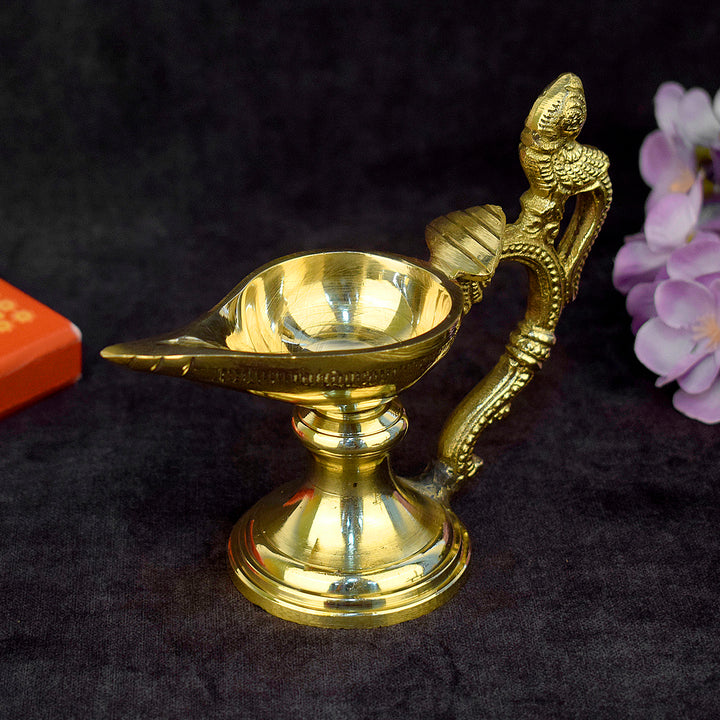 Beautiful Brass Chirag Diya – A finely crafted brass diya designed for traditional lighting, ideal for religious rituals and adding a touch of elegance to home decor. India’s Largest Pooja Accessories Brand – www.satvikstore.in