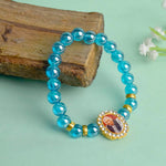 Blue Shiny Beads Single Layer Guruji Swaroop Bracelet featuring sparkling blue beads and Jai Guruji Swaroop – perfect for minimalist spiritual wear, meditation, and gifting. India’s Largest Pooja Accessories Brand – www.satvikstore.in