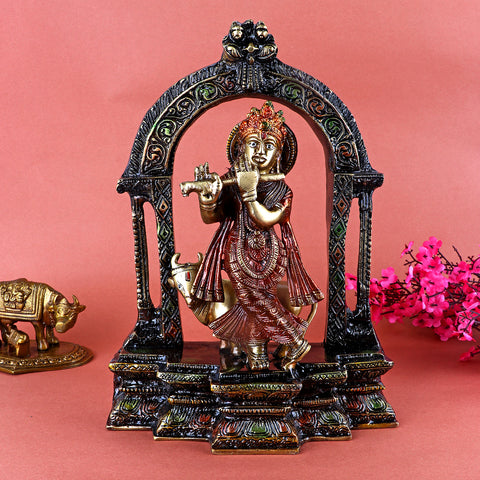 10.5 Inch Handcrafted Brass Krishna Idol featuring Lord Krishna standing gracefully with a flute beside a sacred cow, symbolizing his divine connection with nature, love, and protection. No.1 Brass Idol Store www.satvikstore.in 
