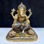 The "9.1 Inch Sacred Ganesh Idol" is a beautifully crafted statue of Lord Ganesha, symbolizing wisdom, success, and the removal of obstacles. Standing at 9.1 inches tall, it features intricate detailing and traditional attributes like the axe, lotus, and modak.India's Largest Puja Accessories Brand - Satvik No. 1 Brass Idol Collection.