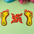 Divine Impressions Charanpaduka and Swastik wall decals featuring sacred footprints and Swastik symbols, perfect for home entrances, pooja rooms, and temple décor to invite blessings and positivity. India’s Largest Pooja Accessories Brand – www.satvikstore.in 