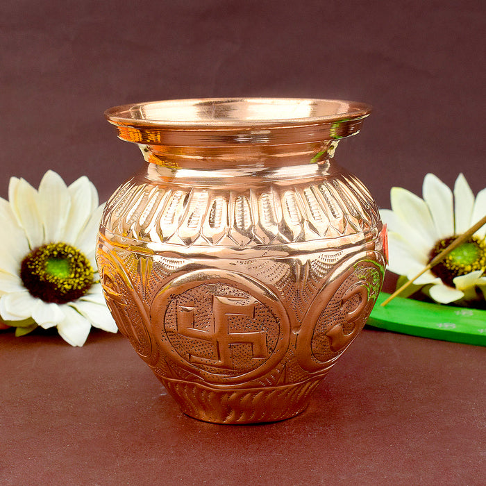 Copper Om Swastik Lota, beautifully crafted with sacred Om and Swastik symbols, ideal for storing holy water during pooja and spiritual rituals. 
India’s Largest Pooja Accessories Brand – www.satvikstore.in 
