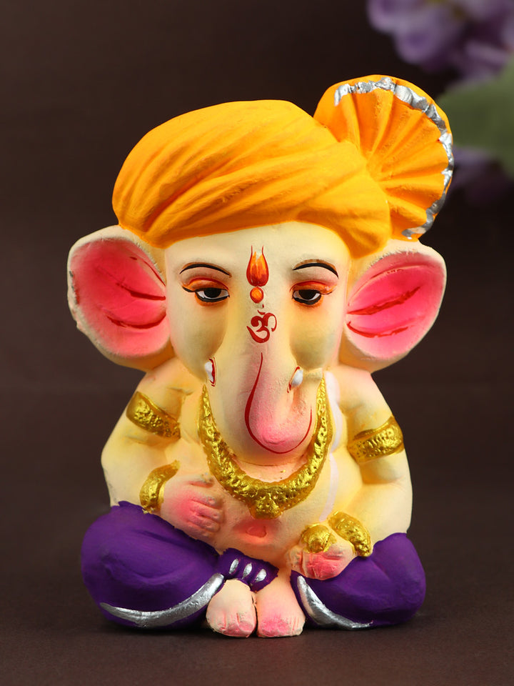 4.3 Inch Cute Eco-Friendly Colorful Bal Ganesha Idol with Orange Pagdi, handcrafted from natural shadu mati for sustainable Ganesh Chaturthi. India’s Largest Pooja Accessories Brand – www.satvikstore.in