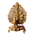 Satvik Stores Presents Stylish Peacock Panch Diya.&nbsp;Any festive occasion will be made wonderfully auspicious by the grace and beauty of the Peacock Brass Handcrafted Hanging Diya. Given that it was made by hand, the piece's abnormalities and flaws only serve to enhance Diya's allure and charisma. 