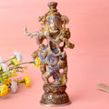  The 9.3 Inch Krishna Idol A Spiritual Icon of Joy and Devotion beautifully captures the essence of Lord Krishna’s divine playfulness and unwavering devotion. Crafted with intricate detail, this idol showcases Krishna in a serene and joyful pose, with his flute in hand, symbolizing the melody of love and spiritual bliss. 