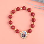 Red Beads Bracelet with Jai Guruji Swaroop