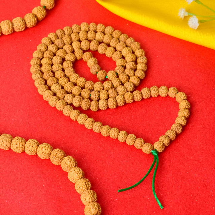 semi Pathariya Rudraksha Mala with natural brown beads for meditation and spiritual chanting. India’s Premium Rudraksha Jap Mala Store- www.satvikstore.in

